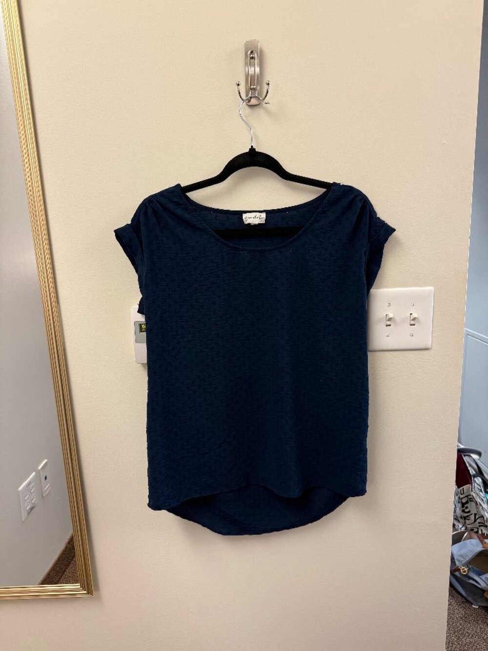 navy blouse with small textured pattern